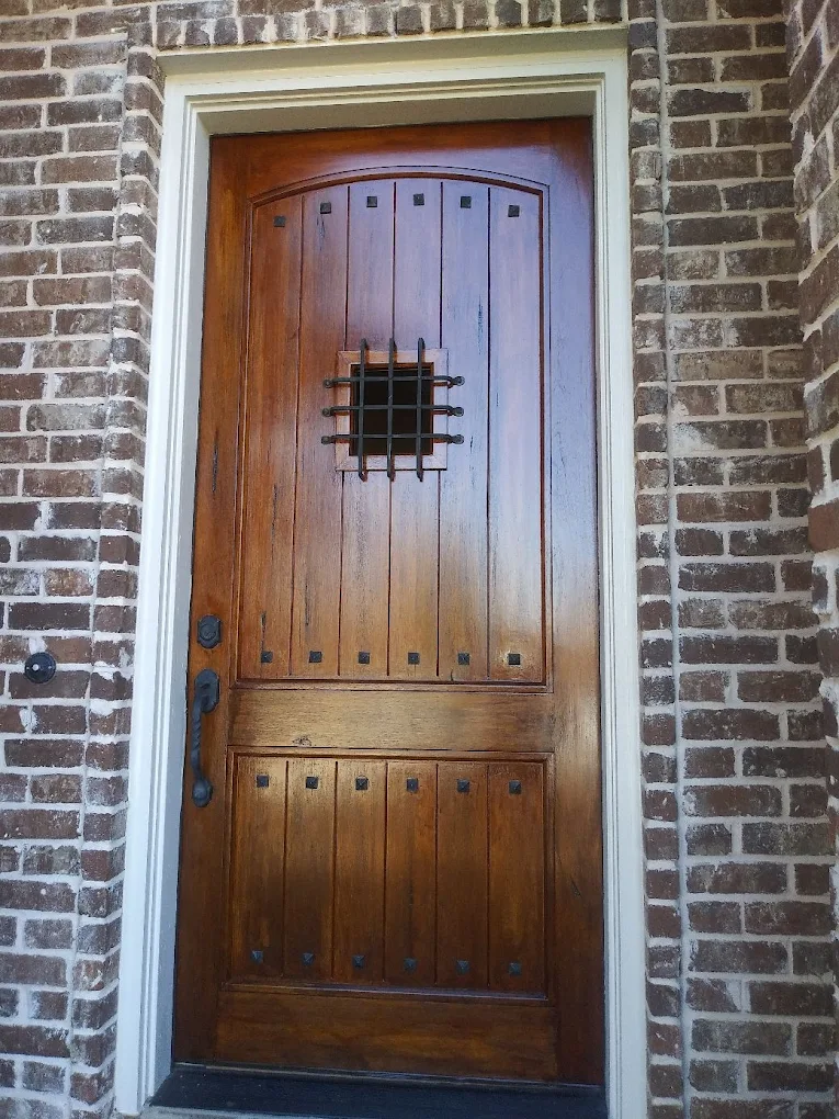 Exterior Entryway — Custom door and brick detail by Jabes Painting